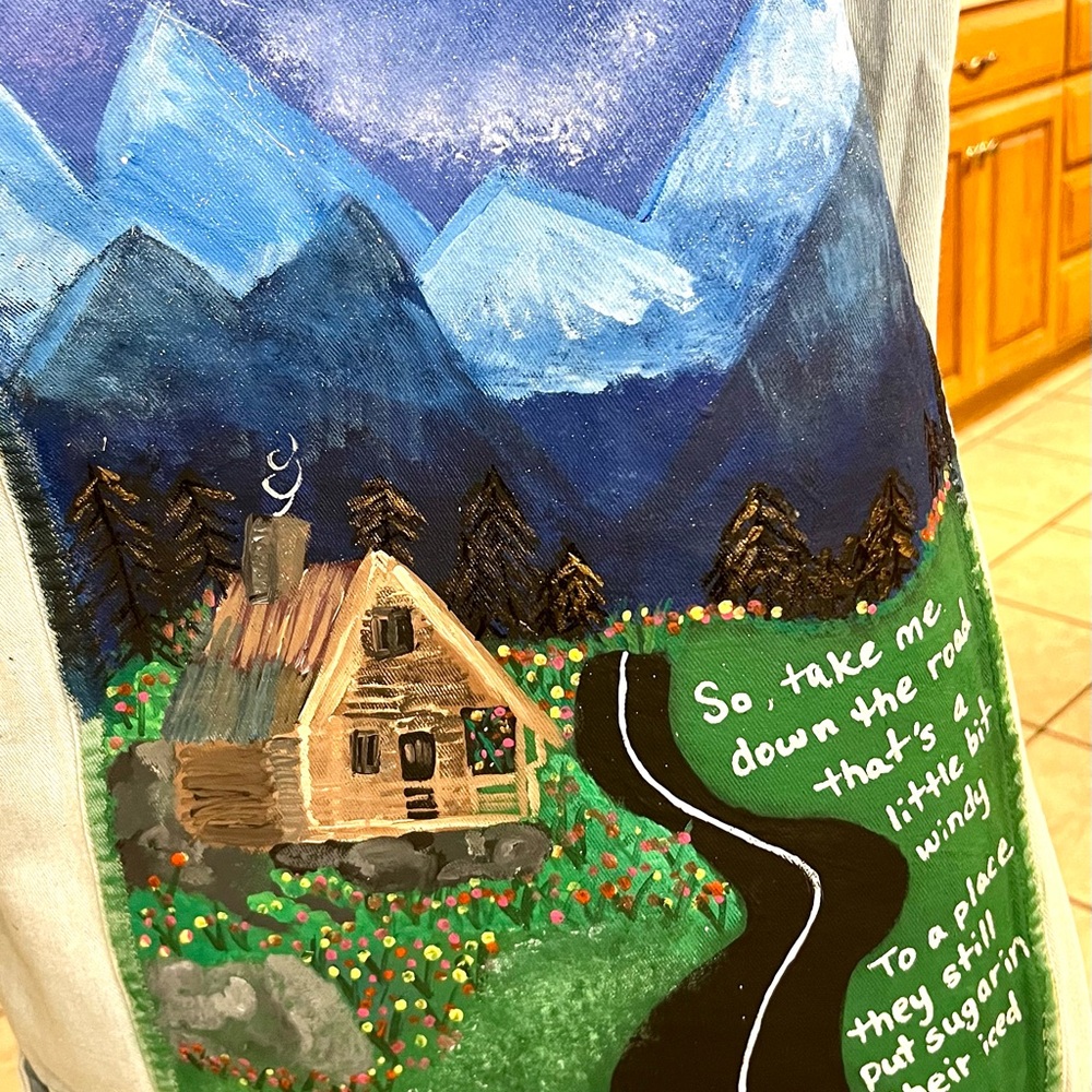 Hand Painted Jean Jacket with mountain scene and song lyrics to “Hey Driver”
